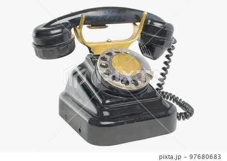 Old grunge vintage Dial Phone on white isolated Old grunge vintage Dial Phone on white isolated 97680683