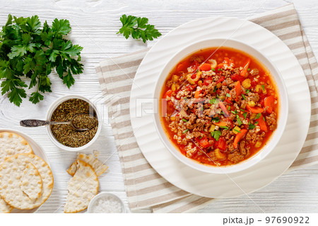 Hamburger Soup with barley and vegetables in bowl Hamburger Soup with barley and vegetables in bowl 97690922