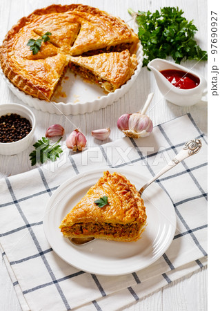 Ground Beef Meat Pie on white wooden table Ground Beef Meat Pie on white wooden table 97690927