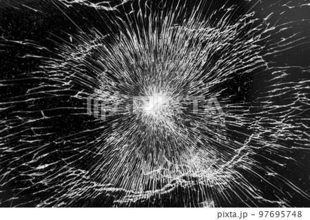 Black broken cracked mobile phone touchscreen. Macro 97695748