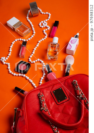flat lay fashionable lady set around orange background. trend colours 97698312