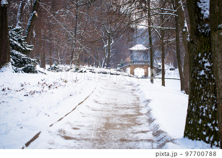Winter view of the road to the Chinese bridge in Oleksandria Park, Ukraine 97700788