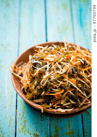 Healthy laminaria salad with carrots and celery Healthy laminaria salad with carrots and celery 97700799