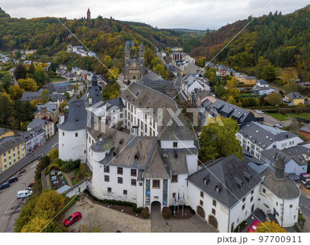 Aerial Drone Shot in Wiltz Luxembourg. View on a Castle at cloudy autumn day in Wiltz 97700911
