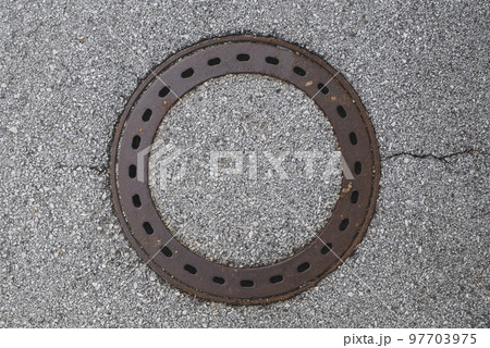 Sewer hatch disguised as asphalt in Slovenia 97703975