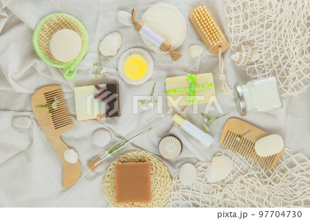 Cosmetics with natural ingredients for body and hair care. Handmade cosmetics products. Top view. Cosmetics with natural ingredients for body and hair care. Handmade cosmetics products. Top view. 97704730