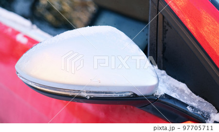 Close-up of snow frozen on a car. The concept of weather conditions Close-up of snow frozen on a car. The concept of weather conditions 97705711