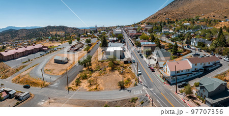 Aerial scenic view of Victorian building on historic Main C street in downtown Virginia City. Cars parked along the street of Virginia, Nevada, USA Aerial scenic view of Victorian building on historic Main C street in downtown Virginia City. Cars parked along the street of Virginia, Nevada, USA 97707356