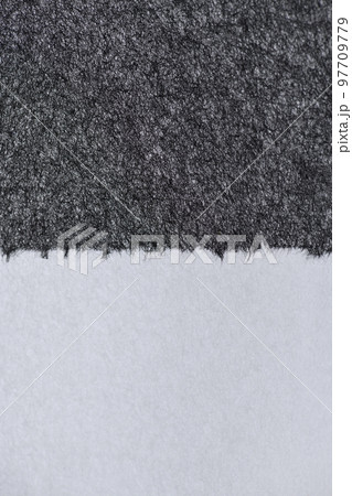 和紙によるツートンカラー背景素材（白と黒） 97709779