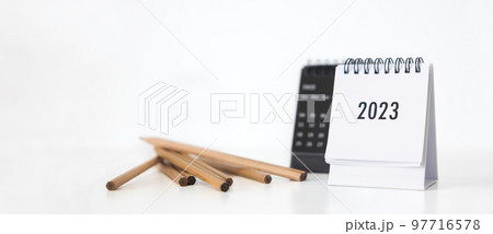 New year 2023 business calendar and pencil on office table in new year day. Make a work plan for the start of the year. Concept about Celebration, Business, Christmas, New Year. 97716578