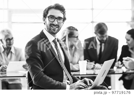 close up. businessman using a laptop in the office. close up. businessman using a laptop in the office. 97719176