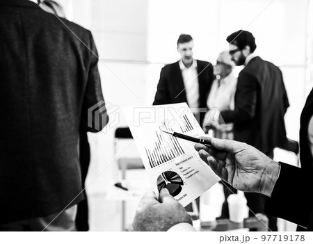 black and white image of a businessman analyzing financial data. black and white image of a businessman analyzing financial data. 97719178