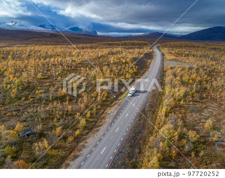drone footage Car Camping Caravan driving road lake Swedish Lapland Sunny fall colors Abisko National Park Sweden drone footage Car Camping Caravan driving road lake Swedish Lapland Sunny fall colors Abisko National Park Sweden 97720252