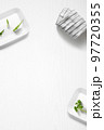 Flat lay of a kitchen with containers and herbs 97720355