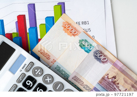 Financial chart with Russian rubles money stack with calculator. Currency appreciation concept 97721197