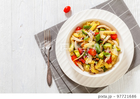 Chicken Pasta Salad with Avocado, Tomato in bowl Chicken Pasta Salad with Avocado, Tomato in bowl 97721686