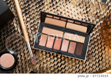 fashion set of new cosmetics eyeshadows palettes with brushes. close up 97724034