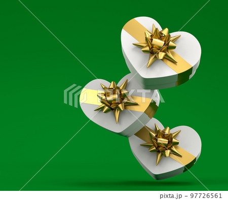 Gift boxes with ribbon and bow for Merry Christmas flying and falling on green 97726561