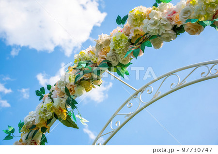Floral wedding arch detail. 97730747