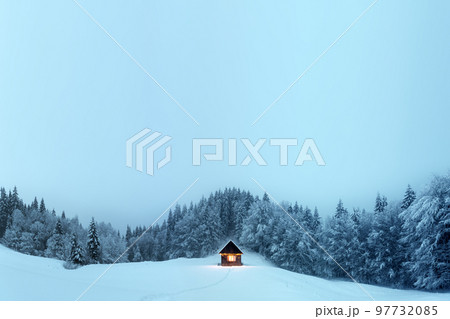 Fantastic landscape with snowy house 97732085