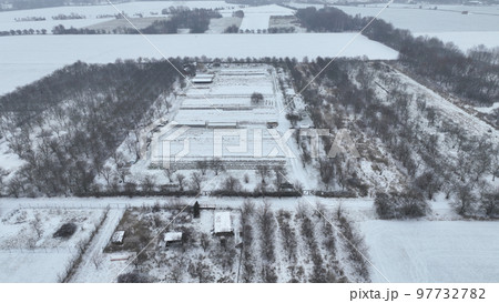 Winter farm field drone aerial snow frost greenhouse foil bio cauliflower leaves leaf Brassica oleracea land crop farming harvest cultivated garden head organic gourd, agriculture plant Europe Winter farm field drone aerial snow frost greenhouse foil bio cauliflower leaves leaf Brassica oleracea land crop farming harvest cultivated garden head organic gourd, agriculture plant Europe 97732782