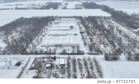 Farm field winter drone aerial snow frost greenhouse foil bio cauliflower leaves leaf Brassica oleracea land crop farming harvest cultivated garden head organic gourd, agriculture plant Europe Farm field winter drone aerial snow frost greenhouse foil bio cauliflower leaves leaf Brassica oleracea land crop farming harvest cultivated garden head organic gourd, agriculture plant Europe 97732783