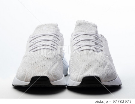 Front view of white sport shoes 97732975