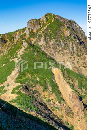 長野県の八ヶ岳登山:赤岳山頂に向かう文三郎道から見る阿弥陀岳 長野県の八ヶ岳登山:赤岳山頂に向かう文三郎道から見る阿弥陀岳 97735308