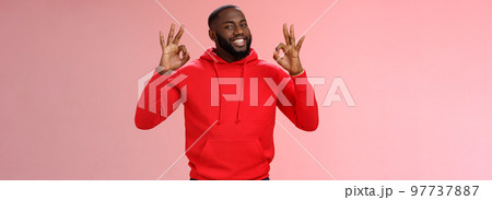 Guy promise perfection. Portrait confident charismatic pleasant african american man show okay no problem gesture say okay smiling assuring everything cool, standing pink background delighted Guy promise perfection. Portrait confident charismatic pleasant african american man show okay no problem gesture say okay smiling assuring everything cool, standing pink background delighted 97737887