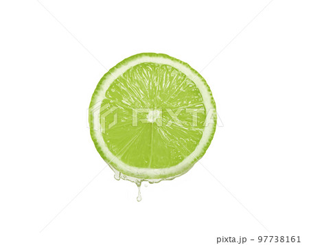 Lemon juice dripping from fruit on white background Lemon juice dripping from fruit on white background 97738161