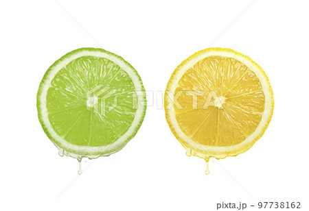 Lemon juice dripping from fruit on white background Lemon juice dripping from fruit on white background 97738162