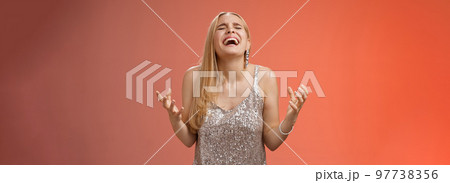 Relieved happy charming blond woman thank god shouting yes celebrating rejoicing win standing red background close eyes laughing happiness clench fists victory triumph gesture, dream came true Relieved happy charming blond woman thank god shouting yes celebrating rejoicing win standing red background close eyes laughing happiness clench fists victory triumph gesture, dream came true 97738356