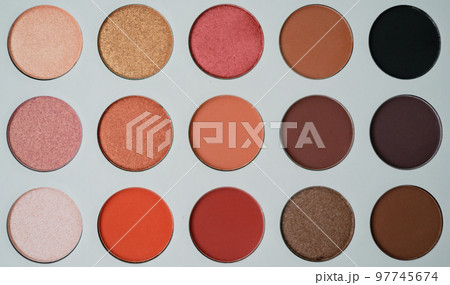 Selective focus of eyeshadow palette with various colors in pearly and matte closeup Selective focus of eyeshadow palette with various colors in pearly and matte closeup 97745674