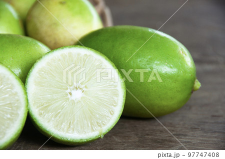 Close up of lemons on wooden basket. Asian food concept 97747408