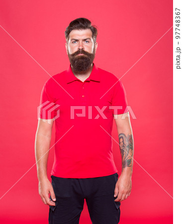 Barber salon. Man bearded hipster with long beard and mustache on red background. Hairstyle is kind of art. Well groomed hipster. Barbershop concept. Facial hair care. Hiring barber. Barber career 97748367