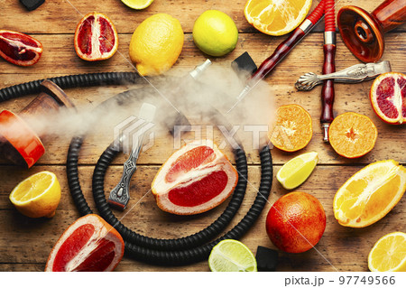 Hookah or kalian with citrus tobacco. 97749566