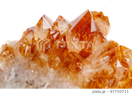 Macro mineral stone Citrine in rock in crystals on a white background Macro mineral stone Citrine in rock in crystals on a white background 97750711