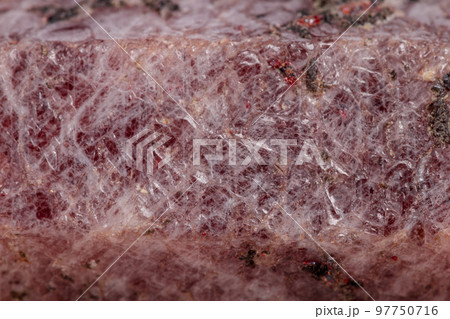 Macro mineral stone Ruby in the breed a white background 97750716
