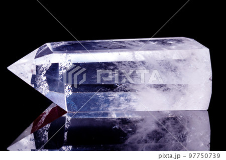 Macro mineral stone Crystal rock crystal on a black background 97750739