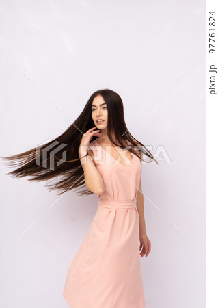 Young woman with long hair. Brunette 97761824