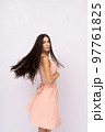 Young woman with long hair. Brunette 97761825