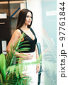 Beautiful confident woman in office 97761844