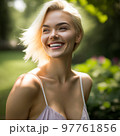 younf blonde woman smiling in summer day 97761856