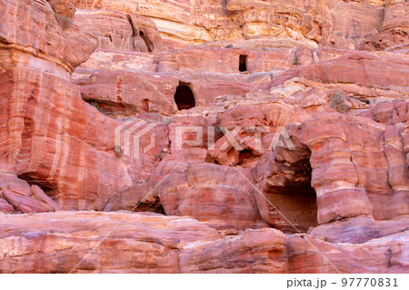 Red rocks caves, canyon of Petra, Jordan Red rocks caves, canyon of Petra, Jordan 97770831