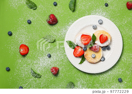 Concept of tasty sweet food, cheese pancakes, space for text 97772229