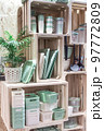 Organization of storage and home space in a loft style. Storage boxes on shelves 97772809