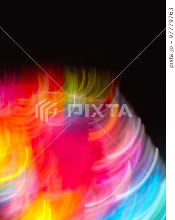Multicolored blurry defocused dynamic sparks flying background. Multicolored blurry defocused dynamic sparks flying background. 97779763