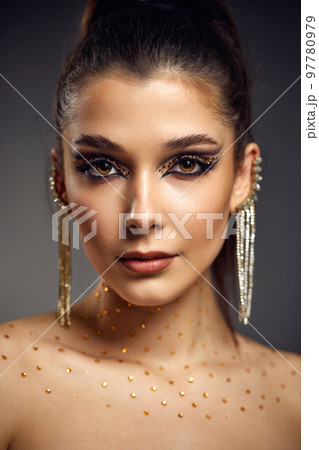 beauty bright eye makeup with arrows with rhinestones beauty bright eye makeup with arrows with rhinestones 97780979
