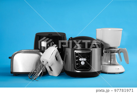 Set of different household appliances on light blue background 97781971