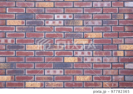Colorful brick wall texture urban background Colorful brick wall texture urban background 97782365